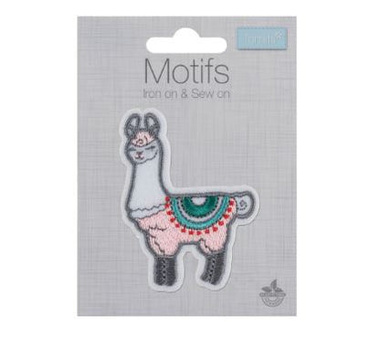 Pink and white llama embroidered motif with green blanket on its back
